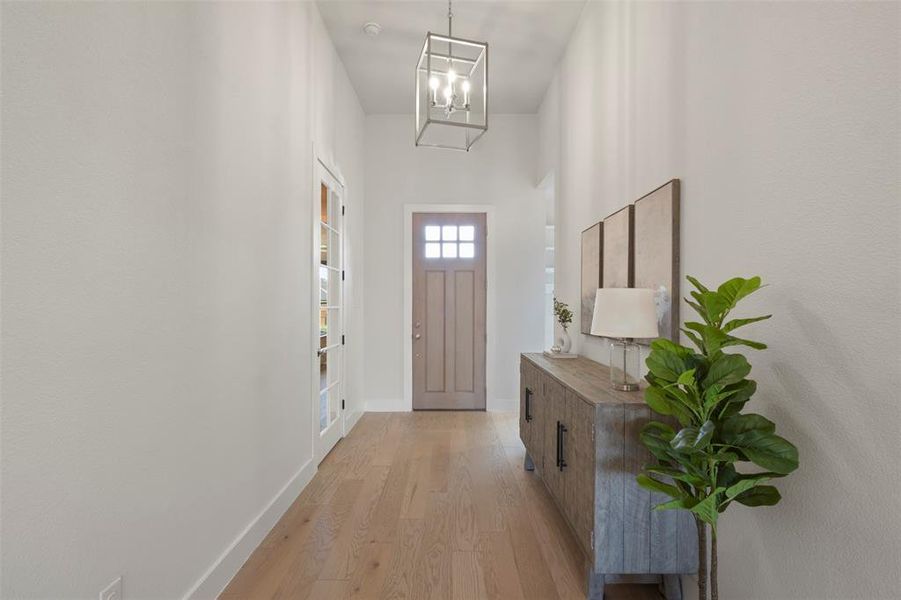 12 Ft ceilings upon entry!
