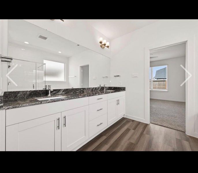 Furnished interior view inside a new home in Harvest Green, Richmond (Image 8).
