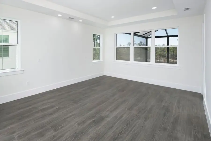 Representative unfurnished interior of a home built from the Grand Spinnaker by Minto Communities in Latitude Margaritaville Watersound, Panama City Beach (Image 17).
