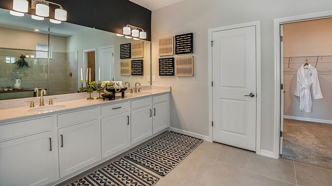 Representative furnished interior of a home built from the Amelia by Taylor Morrison in Windward Preserve, Cocoa (Image 12).