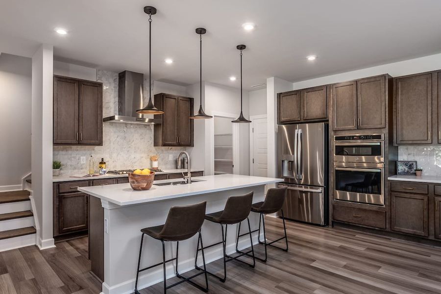 Representative furnished interior of a home built from the Silas by Tri Pointe Homes in The Townes at Willow Park, Cary (Image 3).