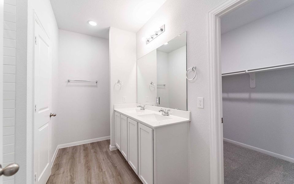 Furnished interior view inside a new home in The Pines at Seven Coves, Willis (Image 8). Furnished interior view inside a new home in The Pines at Seven Coves, Willis (Image 8).