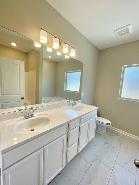 Furnished interior view inside a new home in Brandon Woods, Spring Hill (Image 2). Furnished interior view inside a new home in Brandon Woods, Spring Hill (Image 2).