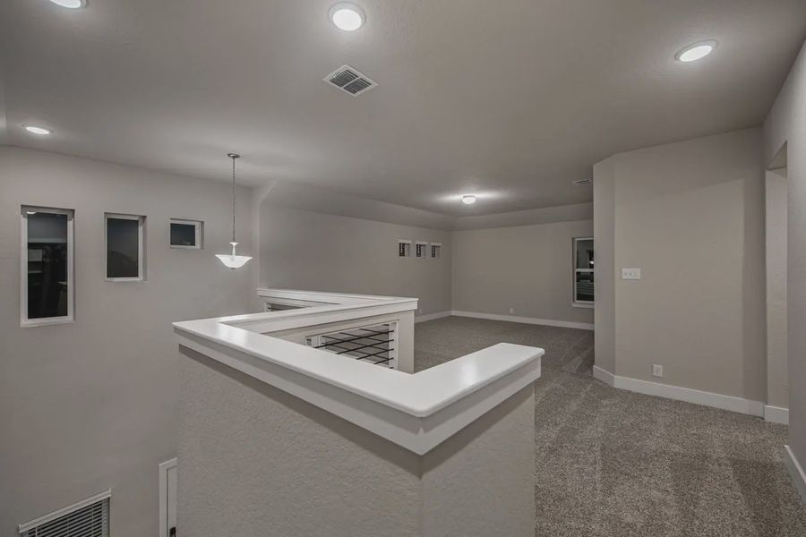 Representative unfurnished interior of a home built from the Jordy by Chesmar Homes in Stillwater Ranch, Buda (Image 19).
