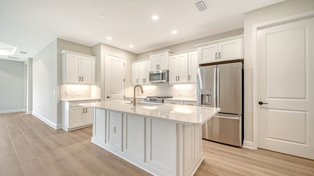 Furnished interior view inside a new home in Vistera of Venice Real Estate and Homes for Sale in Venice, FL - Neal Communities, Venice (Image 5). Furnished interior view inside a new home in Vistera of Venice Real Estate and Homes for Sale in Venice, FL - Neal Communities, Venice (Image 5).