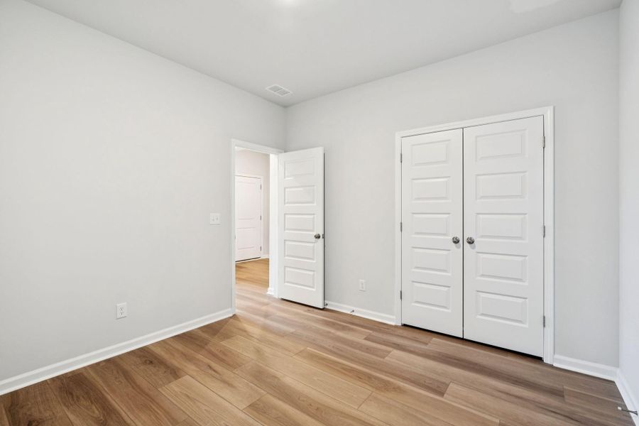 Spacious, unfurnished interior of a new home in Saint John's Lake: Arbor Collection, Johns Island (Image 41).