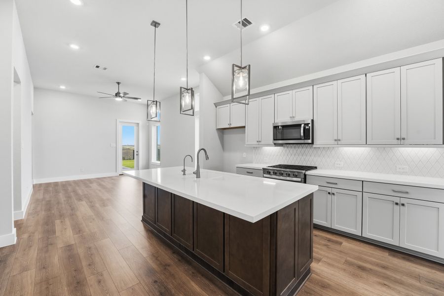 Furnished interior view inside a new home in Bridgeland, Cypress (Image 6).