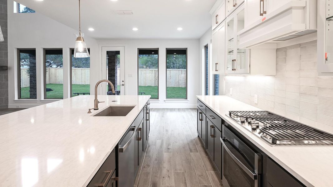 Furnished interior view inside a new home in Hidden Canyon 55', San Antonio (Image 11).