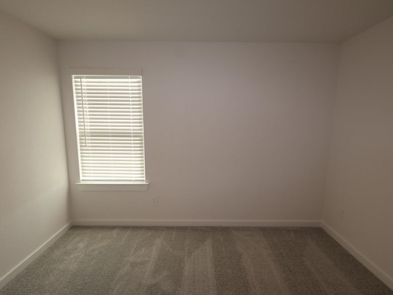 Spacious, unfurnished interior of a new home in Pinewood at Grand Texas, New Caney (Image 20).