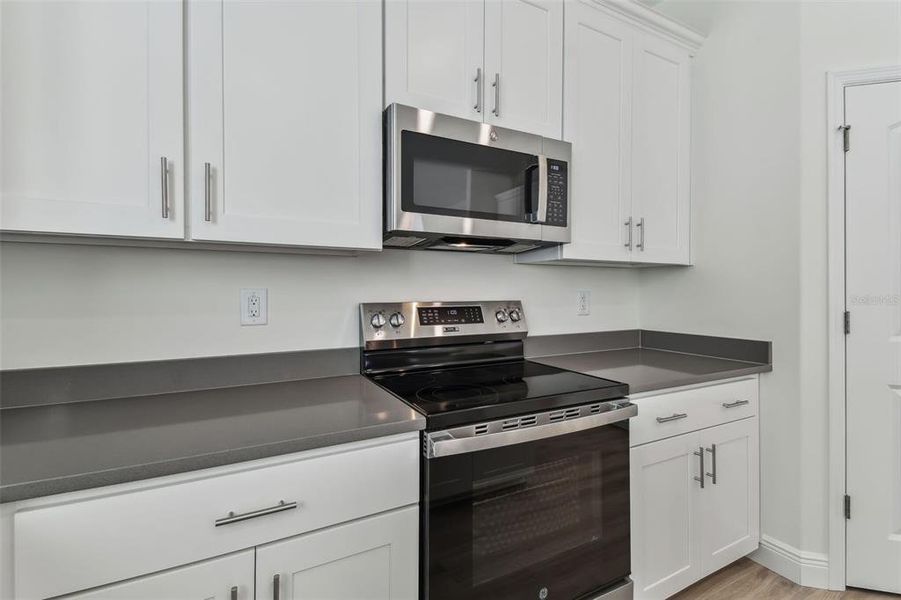 Photos are not the home listed, but same floor plan.