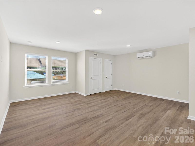 Spacious, unfurnished interior of a new home in North Creek Village, Huntersville (Image 30).
