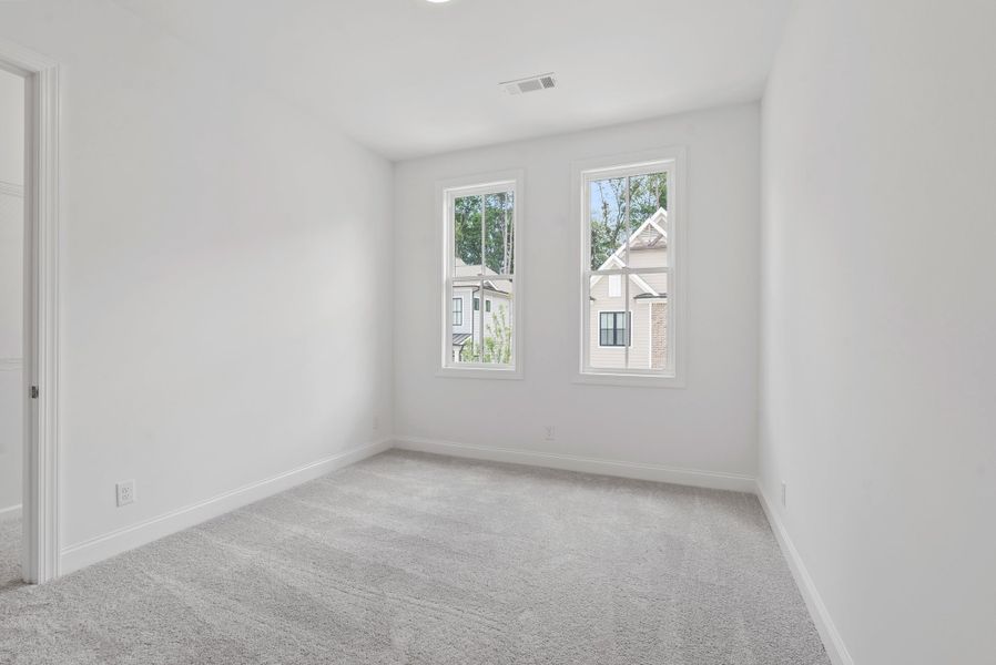 Representative unfurnished interior of a home built from the The Cascade II by The Providence Group in Waterside Condos, Peachtree Corners (Image 24).
