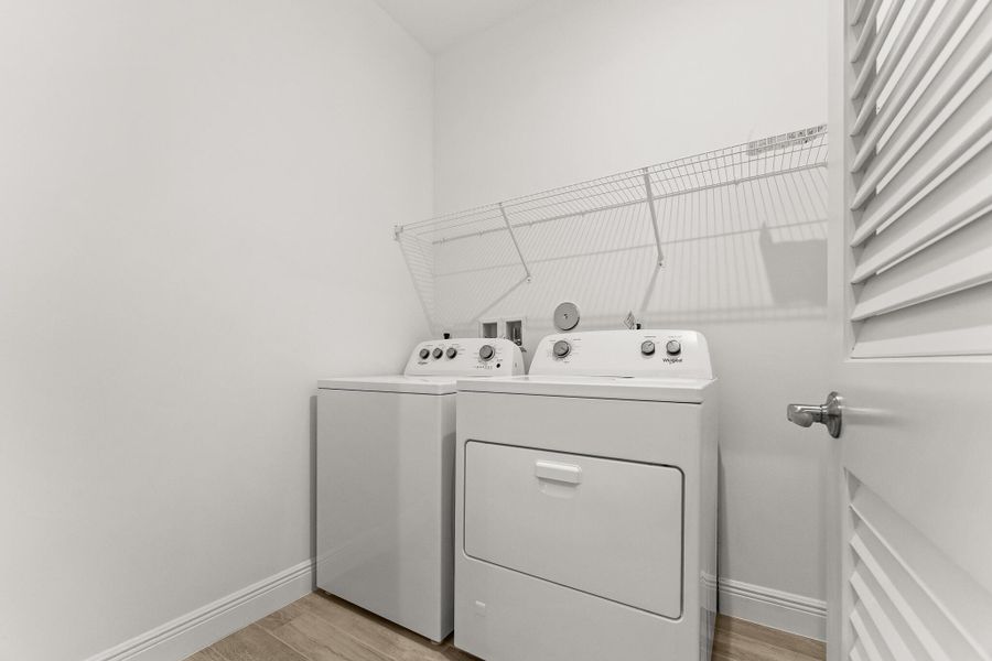 Furnished interior view inside a new home in Newfield - Rosette Park, Palm City (Image 6). Furnished interior view inside a new home in Newfield - Rosette Park, Palm City (Image 6).