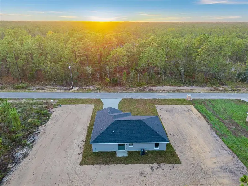 Front exterior of a new home in , Dunnellon, FL, highlighting curb appeal (Image 1). Front exterior of a new home in , Dunnellon, FL, highlighting curb appeal (Image 1).