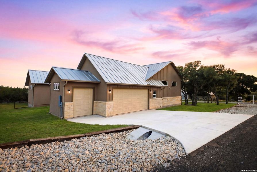 Front exterior of a new home in , Blanco, TX, highlighting curb appeal (Image 2).