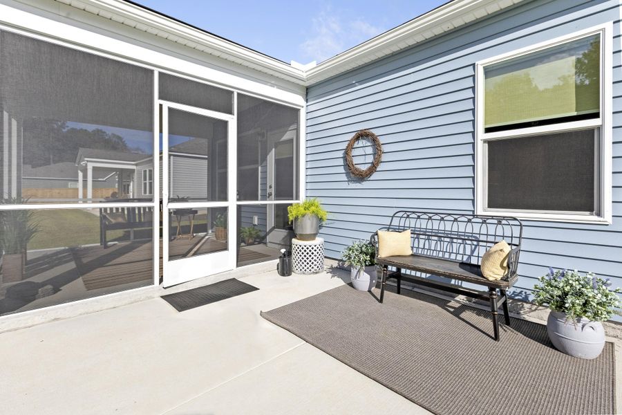 Exterior details and patio area of a home in Cedar Glen Preserve, Huger (Image 27).