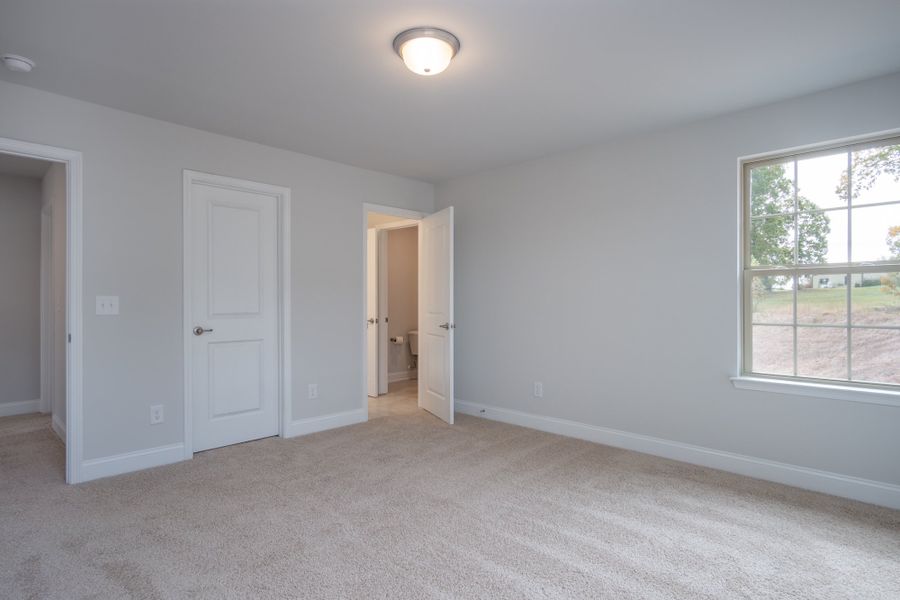 Representative unfurnished interior of a home built from the 3030 by Adams Homes in Parkland Place, Pace (Image 33).