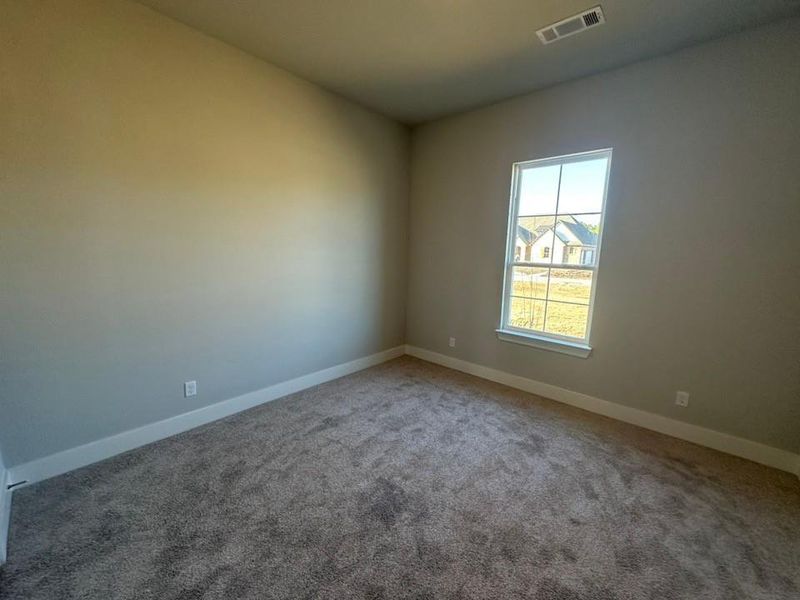 Spacious, unfurnished interior of a new home in Fannin Ranch, Leonard (Image 8).