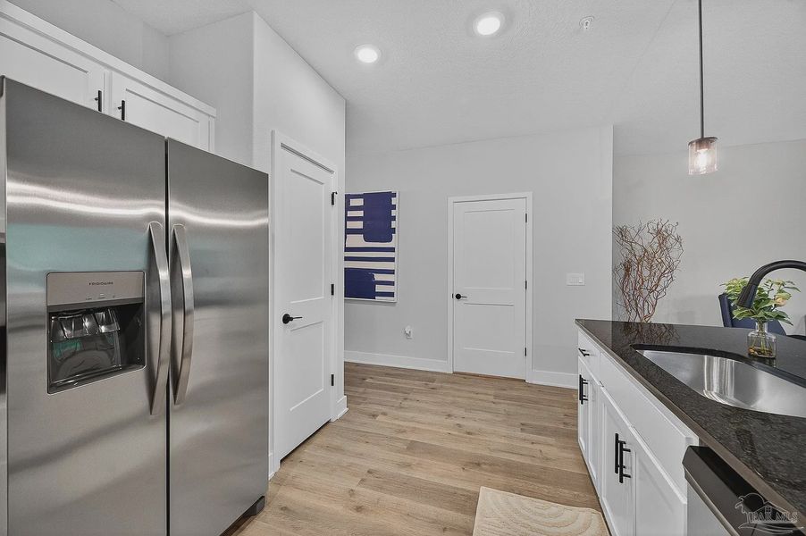 Furnished interior view inside a new home in Lexlee Estates, Pensacola (Image 7).