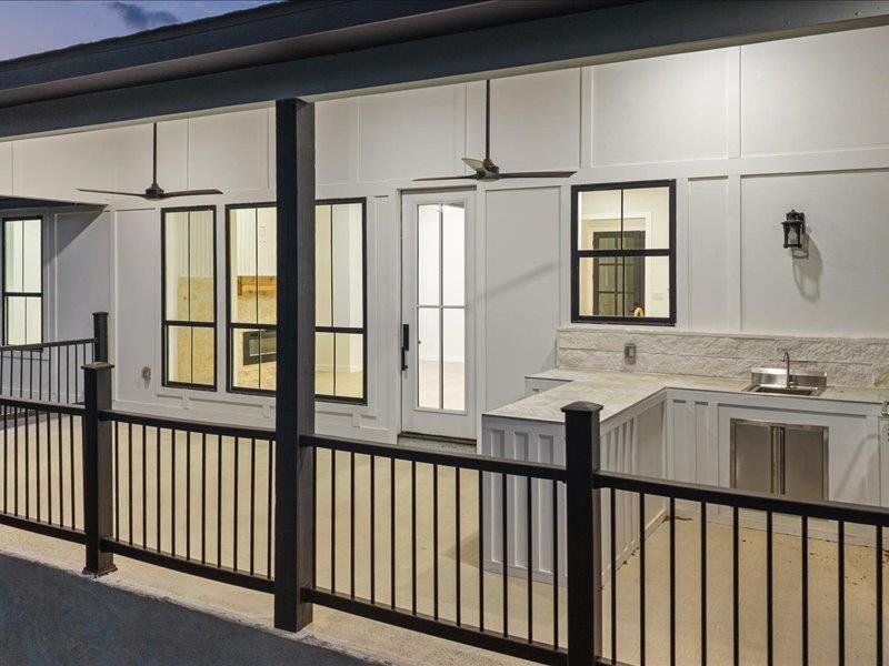 Exterior details and patio area of a home in , Wimberley (Image 25).