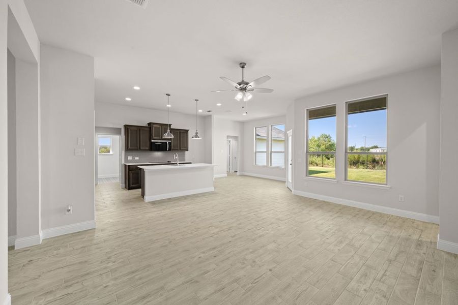 Front exterior of a new home in Still Water Lake, Godley, TX, highlighting curb appeal (Image 17). Front exterior of a new home in Still Water Lake, Godley, TX, highlighting curb appeal (Image 17).