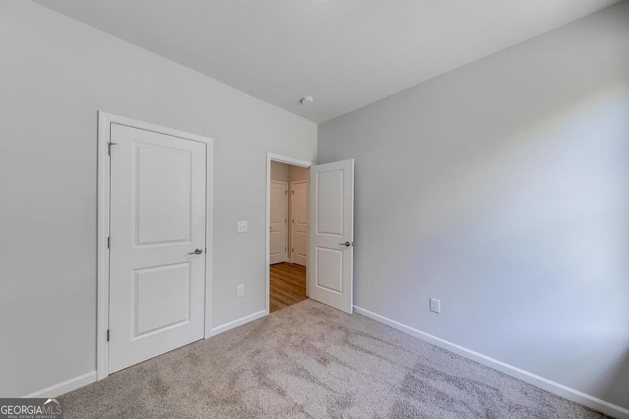 Spacious, unfurnished interior of a new home in Chimney Oaks Townhomes, Homer (Image 26).