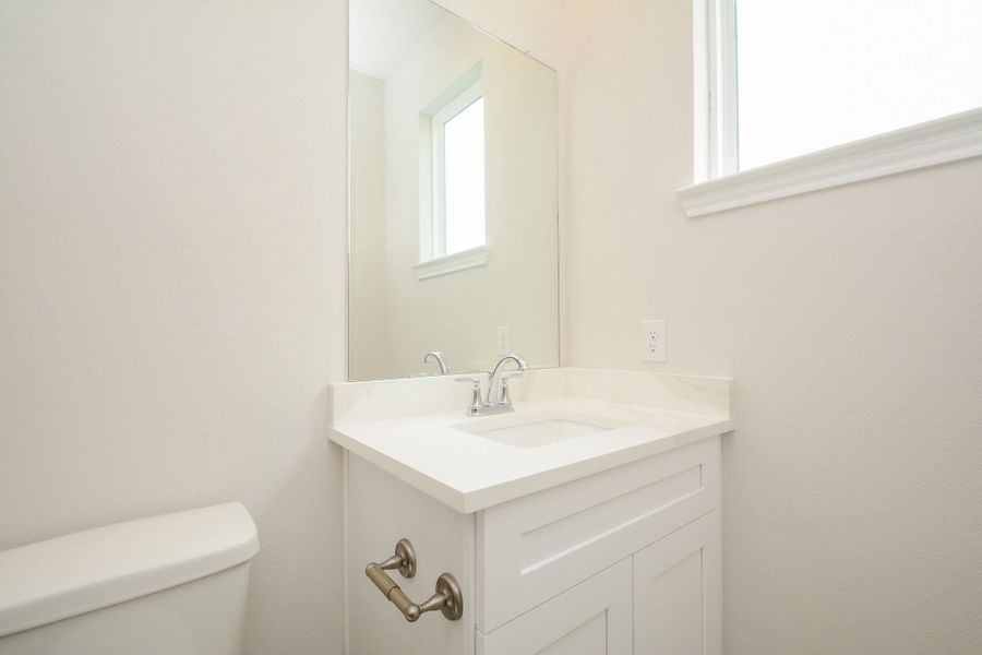 Discover this well-appointed bathroom that is attached to the bedroom.
