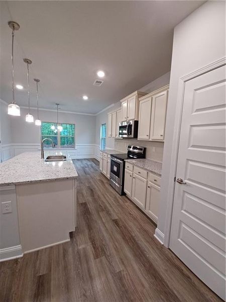 Furnished interior view inside a new home in Magnolia Villas, Cornelia (Image 10).