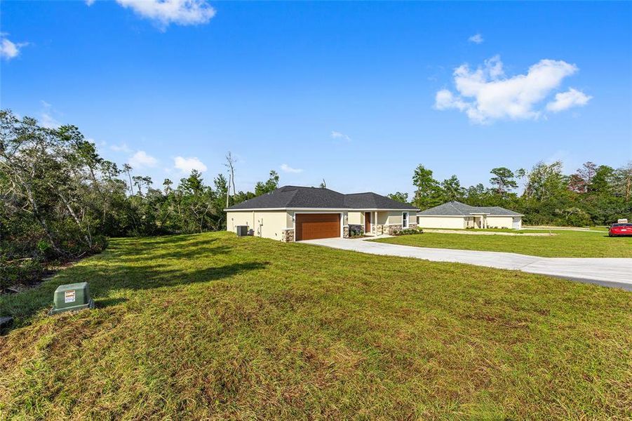 Exterior details and patio area of a home in , Ocala (Image 42).