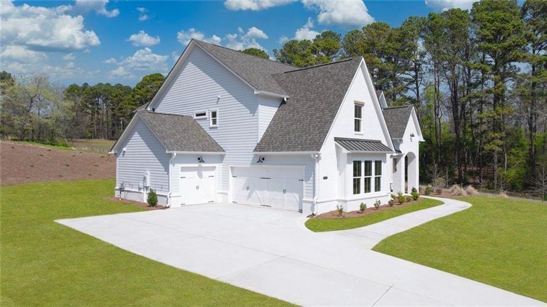 Front exterior of a new home in , Gainesville, GA, highlighting curb appeal (Image 30).