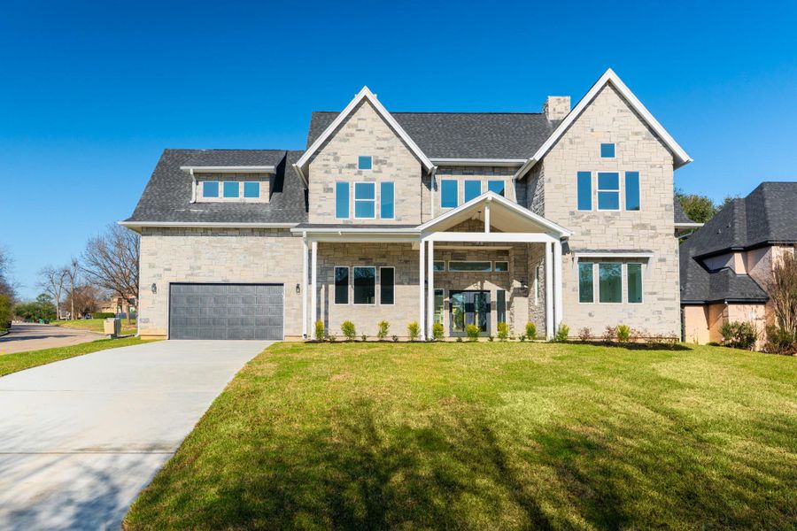 Front exterior of a new home in , Montgomery, TX, highlighting curb appeal (Image 2). Front exterior of a new home in , Montgomery, TX, highlighting curb appeal (Image 2).