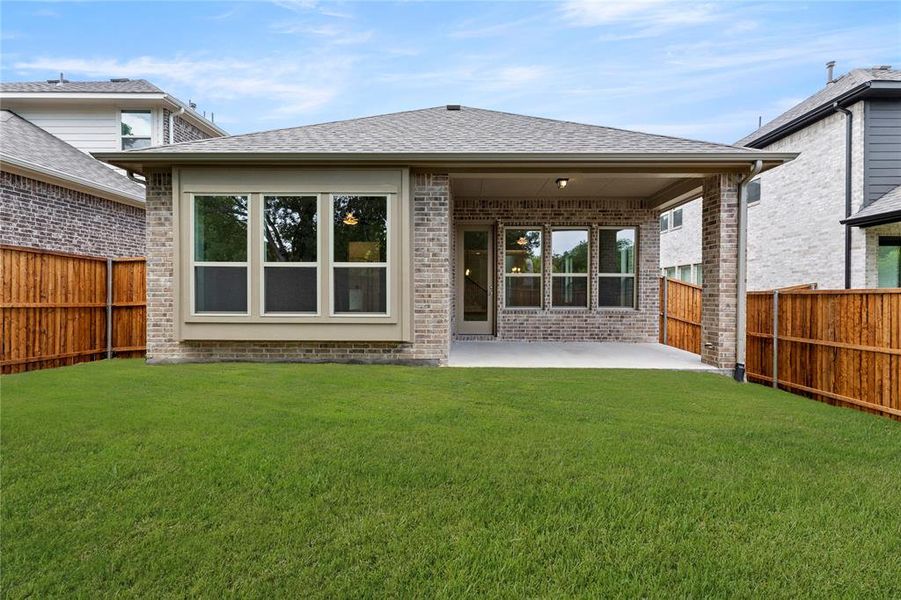 Exterior details and patio area of a home in Villas at Long Branch, Rowlett (Image 3). Exterior details and patio area of a home in Villas at Long Branch, Rowlett (Image 3).