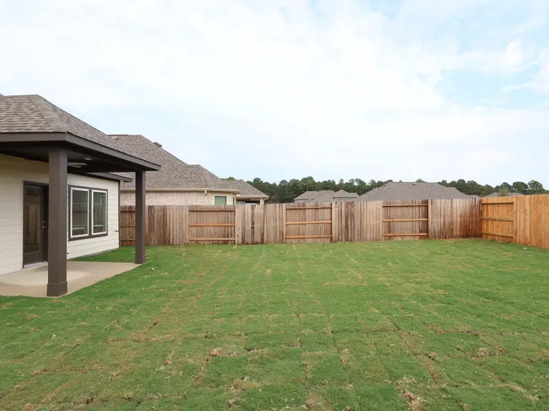 Exterior details and patio area of a home in Sorella, Tomball (Image 4).