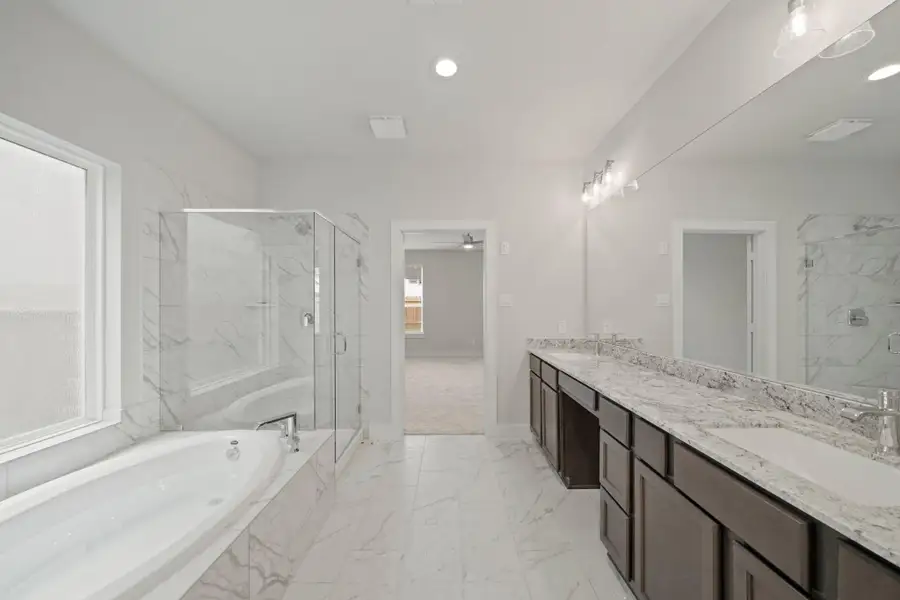 Furnished interior view inside a new home in Barton Creek Ranch, Conroe (Image 6).