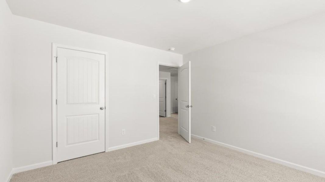 Spacious, unfurnished interior of a new home in Parkside at Carter Grove, Cartersville (Image 26).