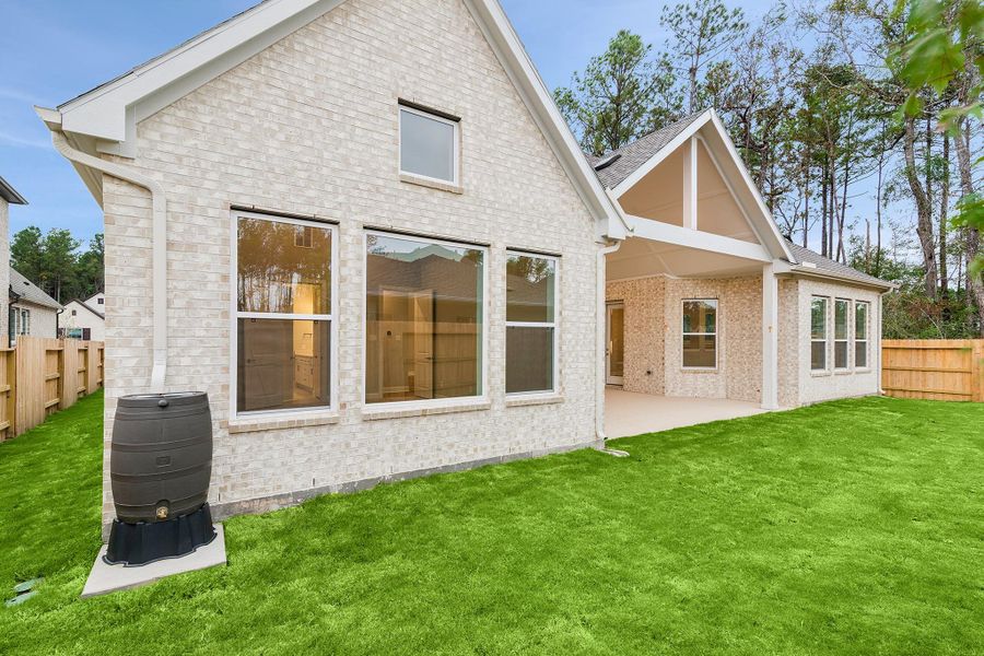 Exterior details and patio area of a home in ARTAVIA 65' Homesites, Conroe (Image 4).