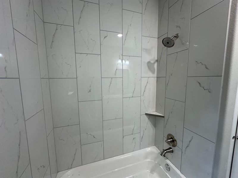 Bathroom with tub / shower combination Bathroom with tub / shower combination