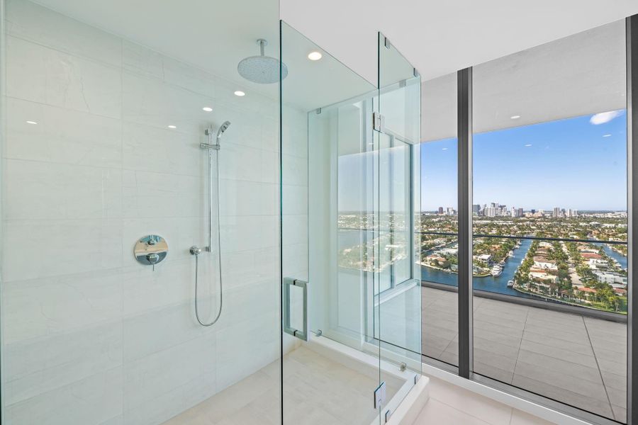 Primary suite bathroom with unobstructed Intracoastal and city view Primary suite bathroom with unobstructed Intracoastal and city view
