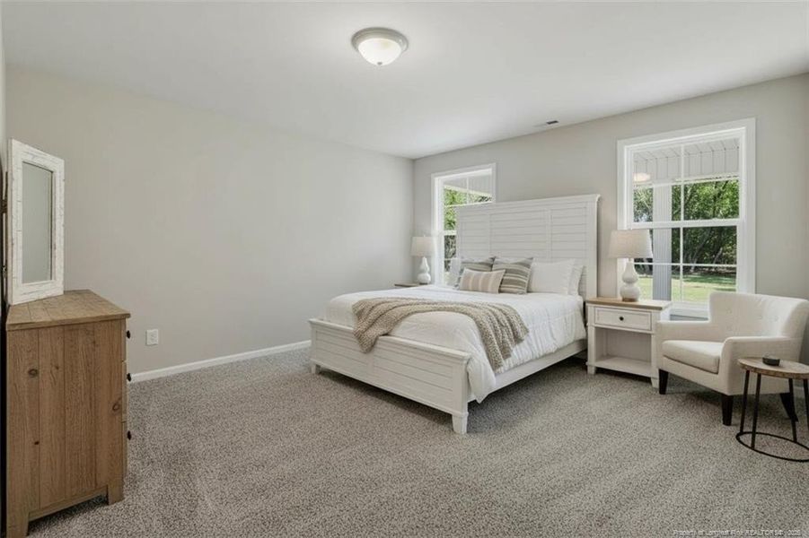 Beautifully staged master bedroom