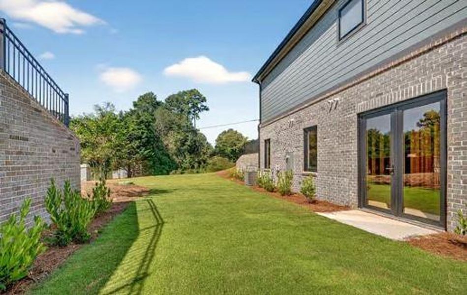 Front exterior of a new home in , Cumming, GA, highlighting curb appeal (Image 46).