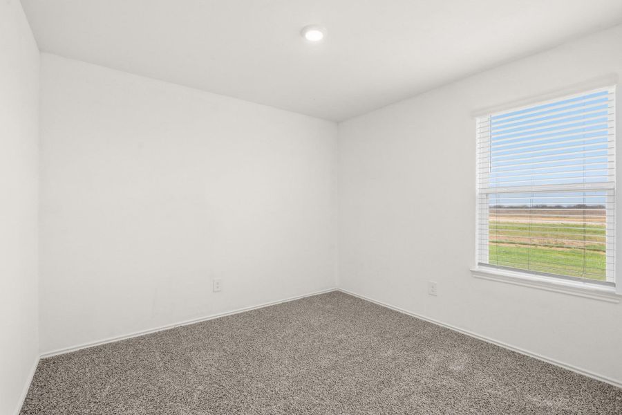 Primary bedroom with views to the water!