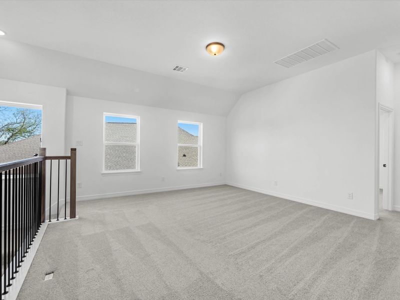 Upstairs loft. Sample product photo. Actual exterior and interior selections may vary by homesite. Photo may be virtually staged.