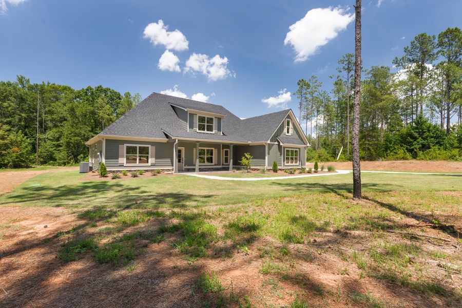 Front exterior of a new home in Stewart Estates, Meansville, GA, highlighting curb appeal (Image 26).