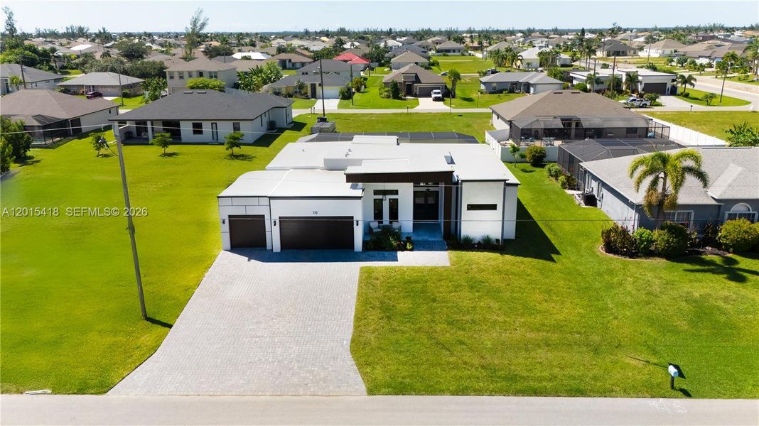 Front exterior of a new home in , Cape Coral, FL, highlighting curb appeal (Image 22).
