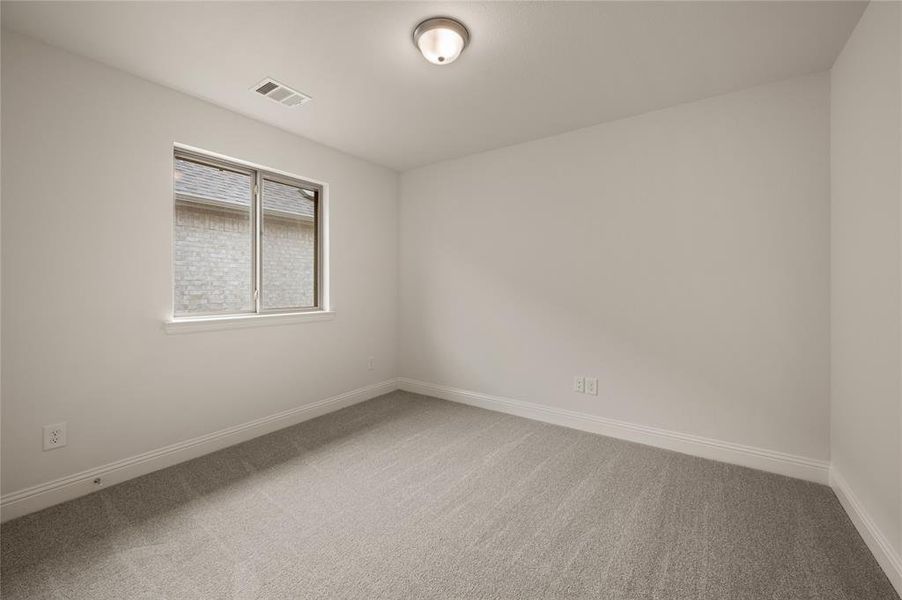 Spacious, unfurnished interior of a new home in The Reserve at Spiritas Ranch, Little Elm (Image 11).