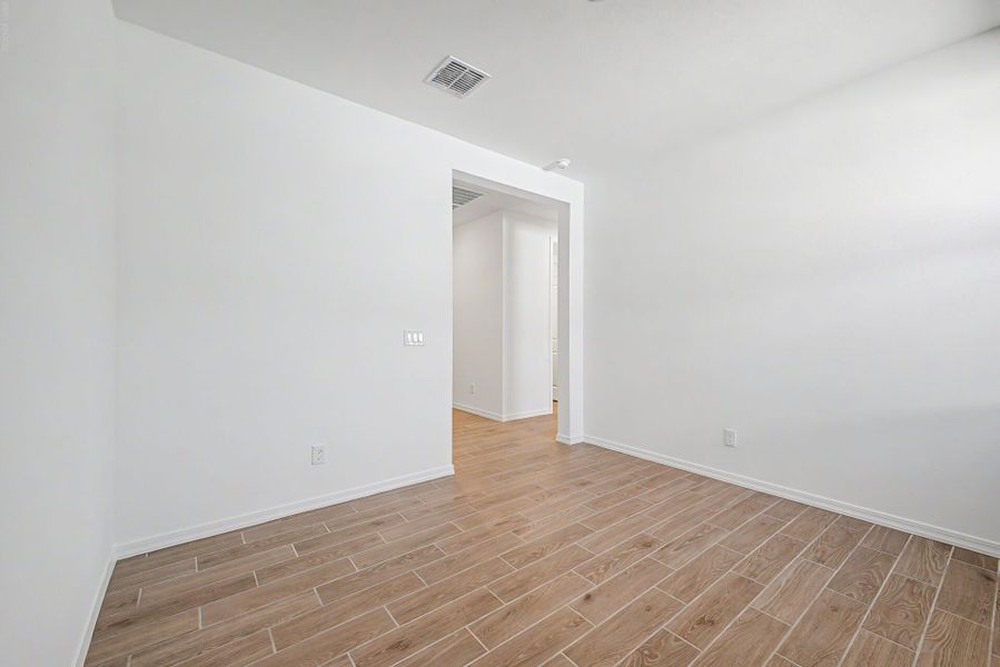 Spacious, unfurnished interior of a new home in White Tank Vistas, Waddell (Image 15). Spacious, unfurnished interior of a new home in White Tank Vistas, Waddell (Image 15).