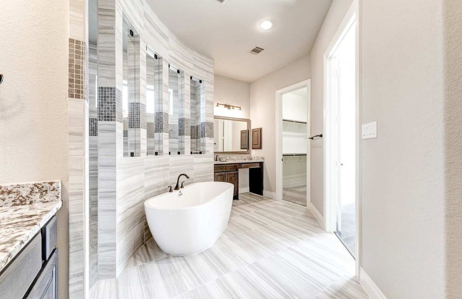 Representative furnished interior of a home built from the 4590 by Ravenna Homes in Artavia 70′, Conroe (Image 6).