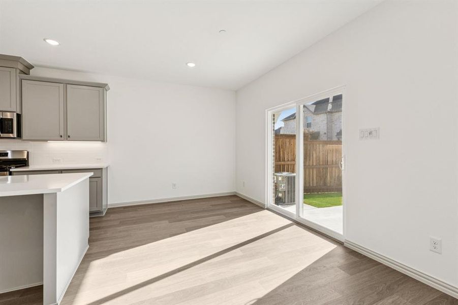 Your beautiful new dining room opens onto your private back patio making dining al fresco a breeze!