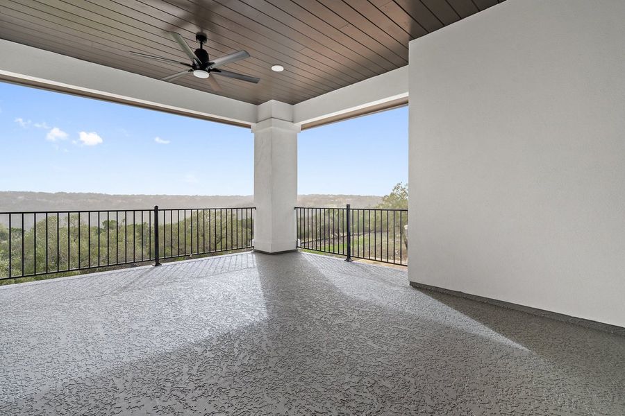Exterior details and patio area of a home in Milky Way at River Place, Austin (Image 7).