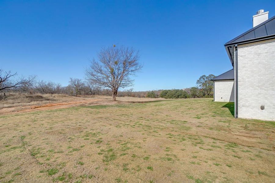 Exterior details and patio area of a home in , Weatherford (Image 25).